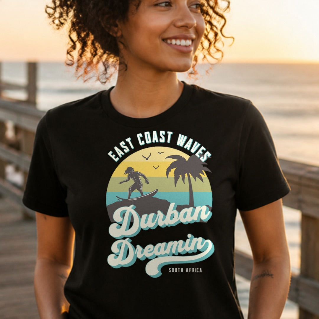 Woman wearing the Durban Dreamin' tee on a seaside pier - 12 Seconds Apparel