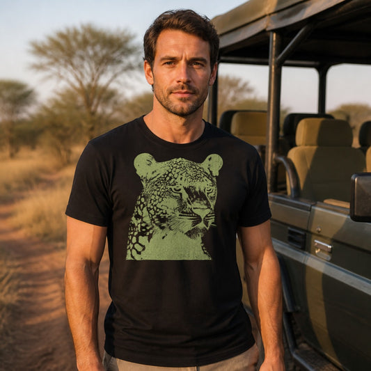 Man wearing the Ingwe leopard tee beside a safari game-drive vehicle - 12 Seconds Apparel
